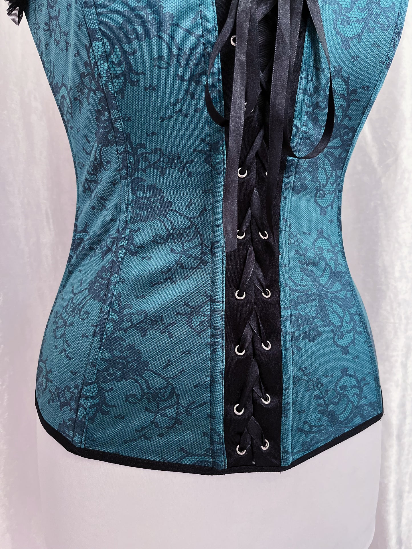 Iconic teal lace-up corset with mesh back 🕸️