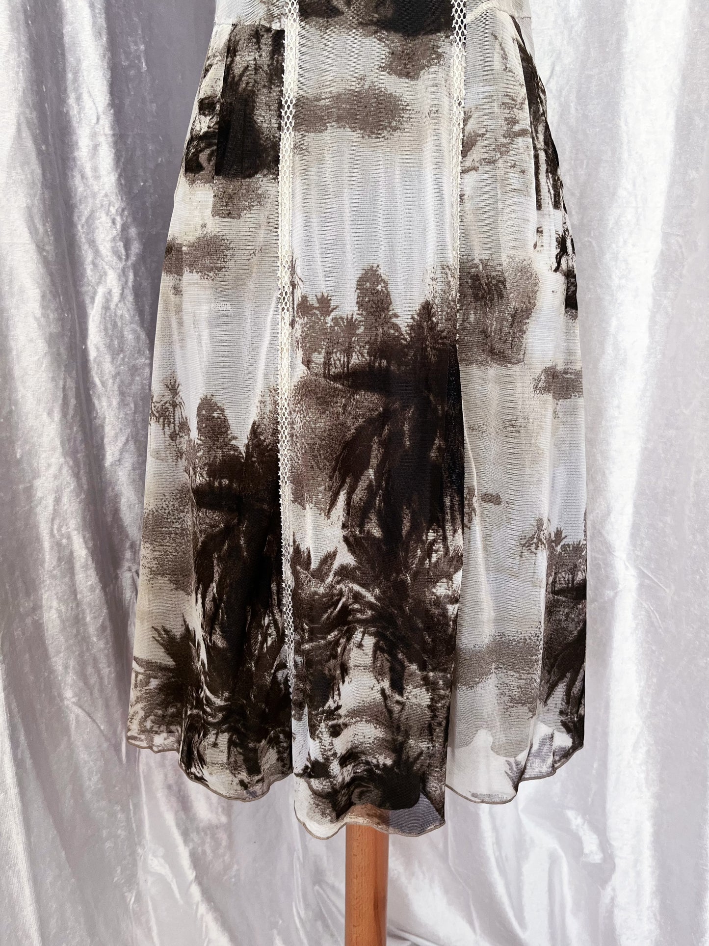 00's iconic mesh printed dress with little pockets on the sides ✨