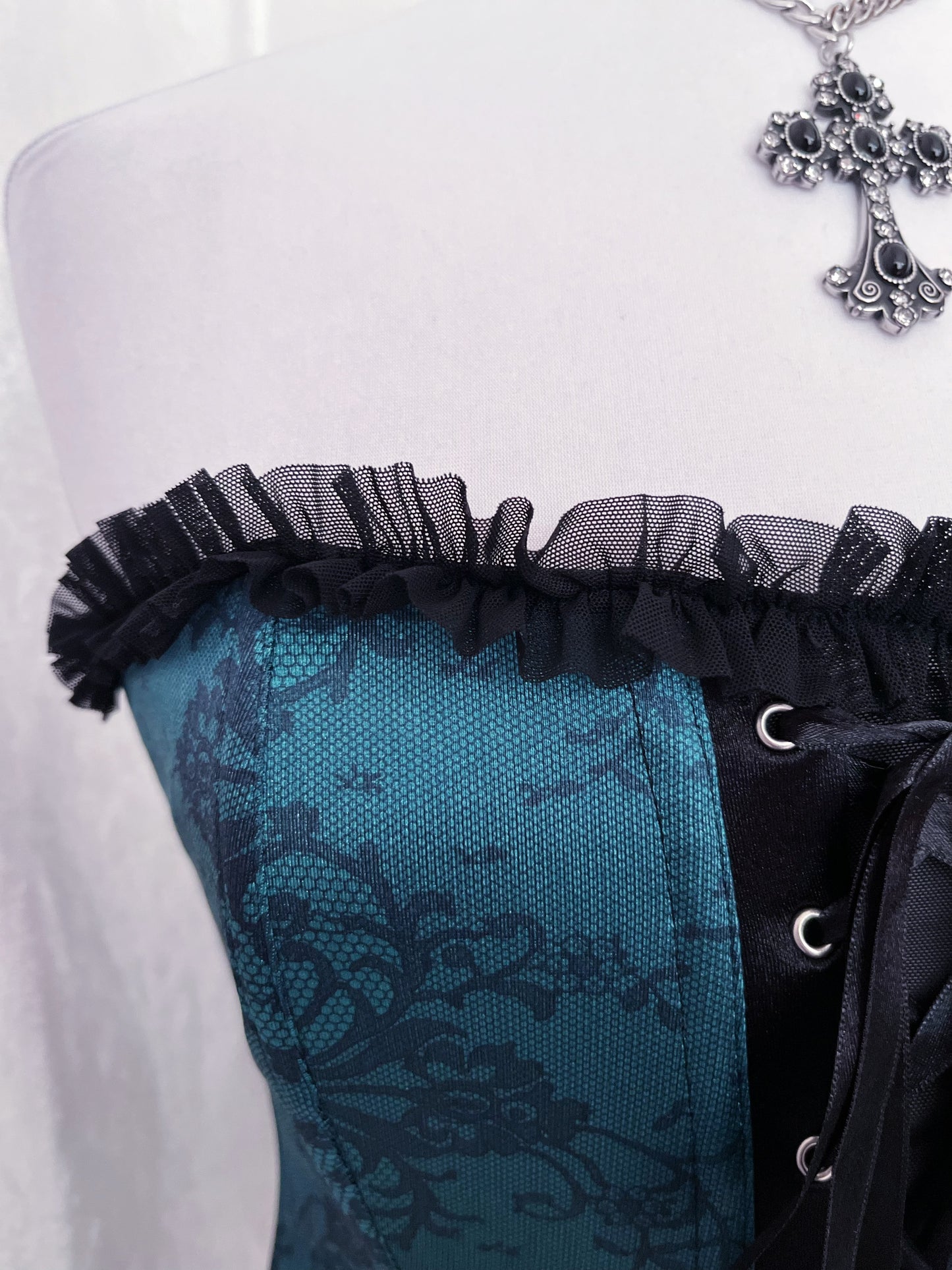 Iconic teal lace-up corset with mesh back 🕸️