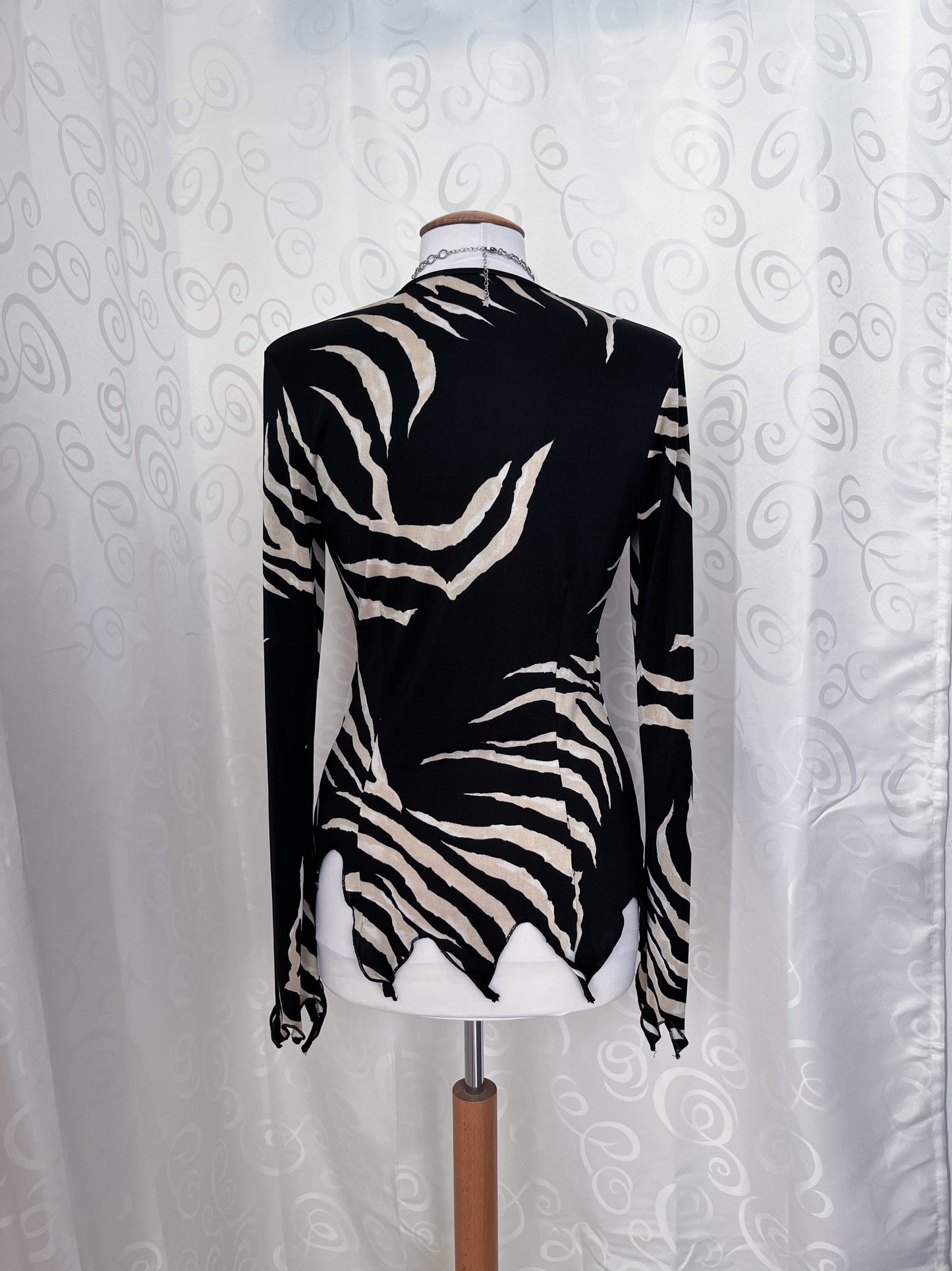 Hot zebra print asymmetrical top with lace-up detail 🦓🖤