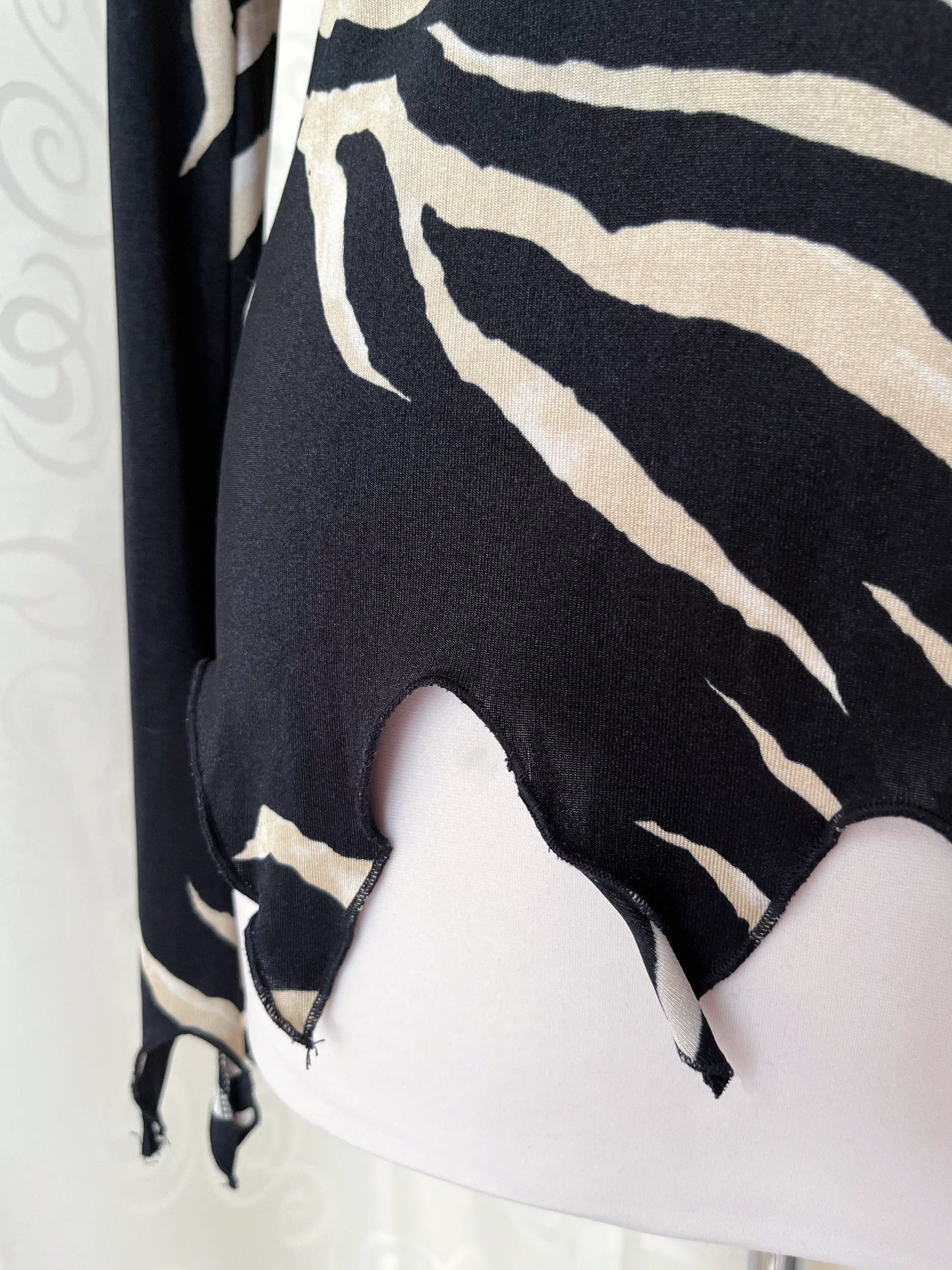 Hot zebra print asymmetrical top with lace-up detail 🦓🖤