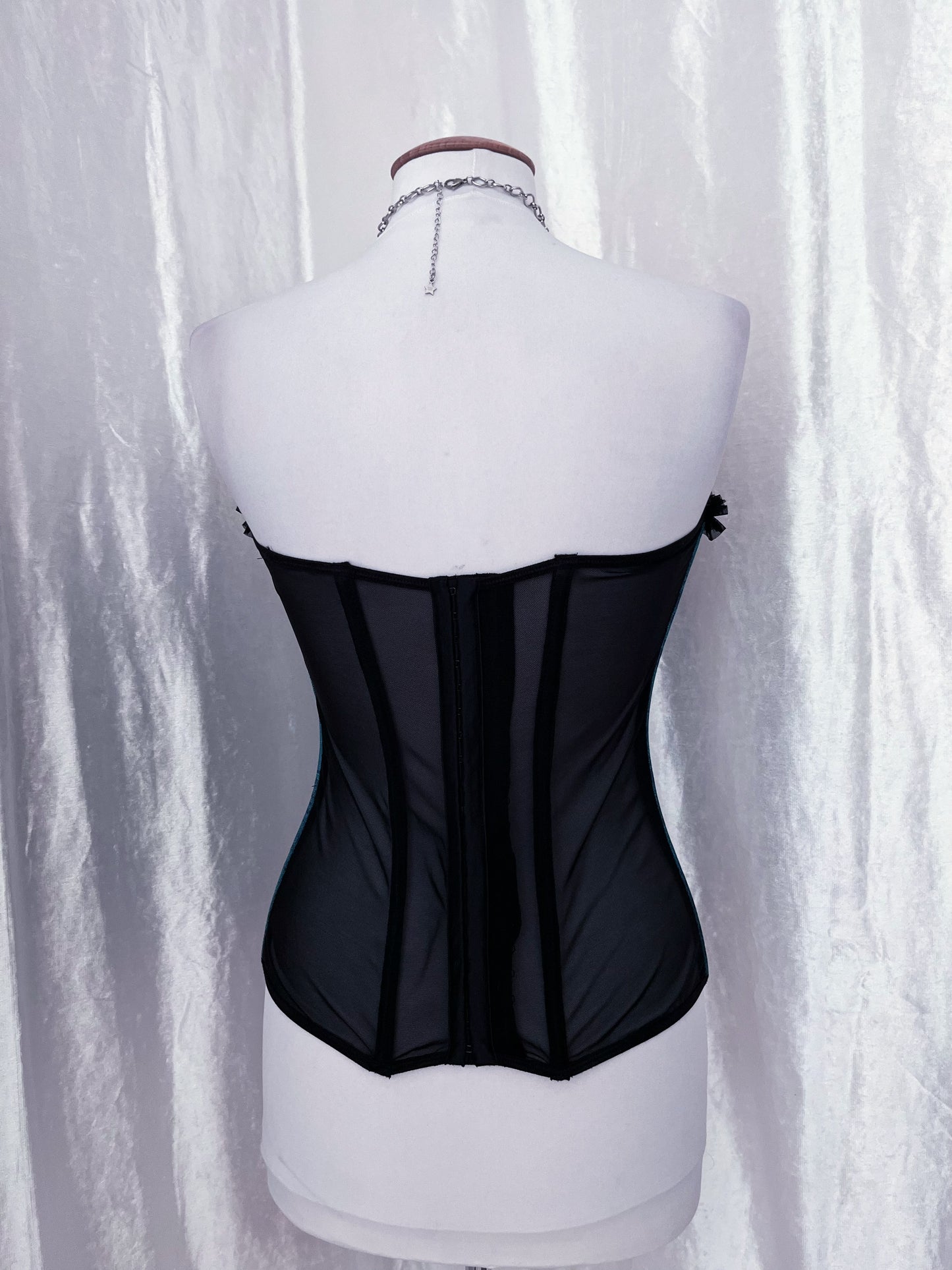 Iconic teal lace-up corset with mesh back 🕸️
