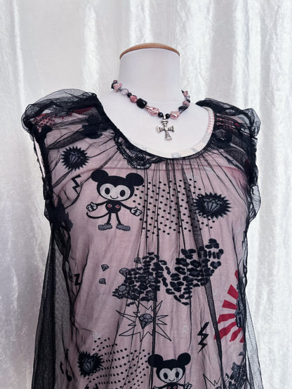 Twee 00’s top with cartoon & pop-culture print fabric with mesh layer on top 🐁🎪