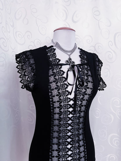 Witchy black top with embroidered cut-out detail 🕷️🕸️