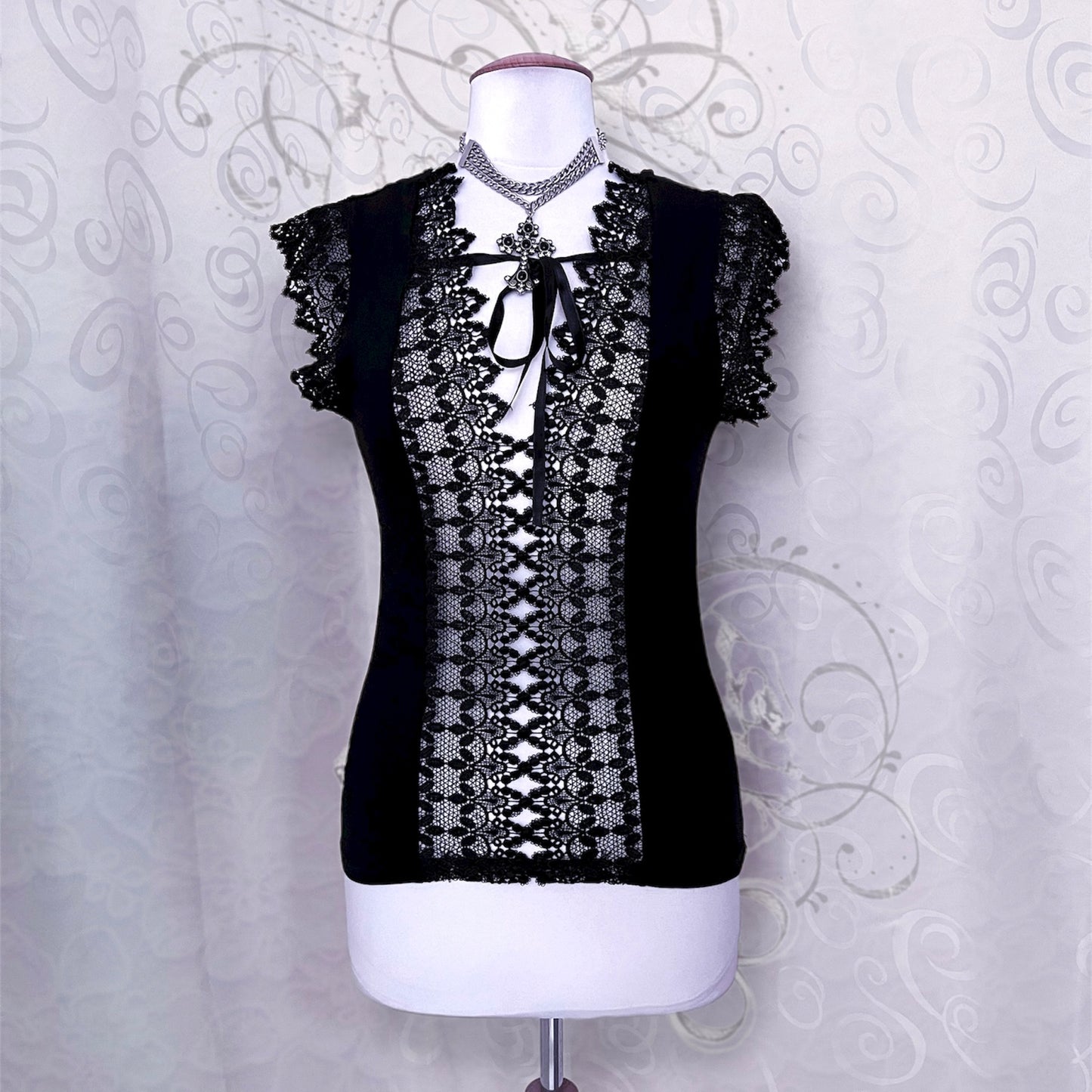 Witchy black top with embroidered cut-out detail 🕷️🕸️