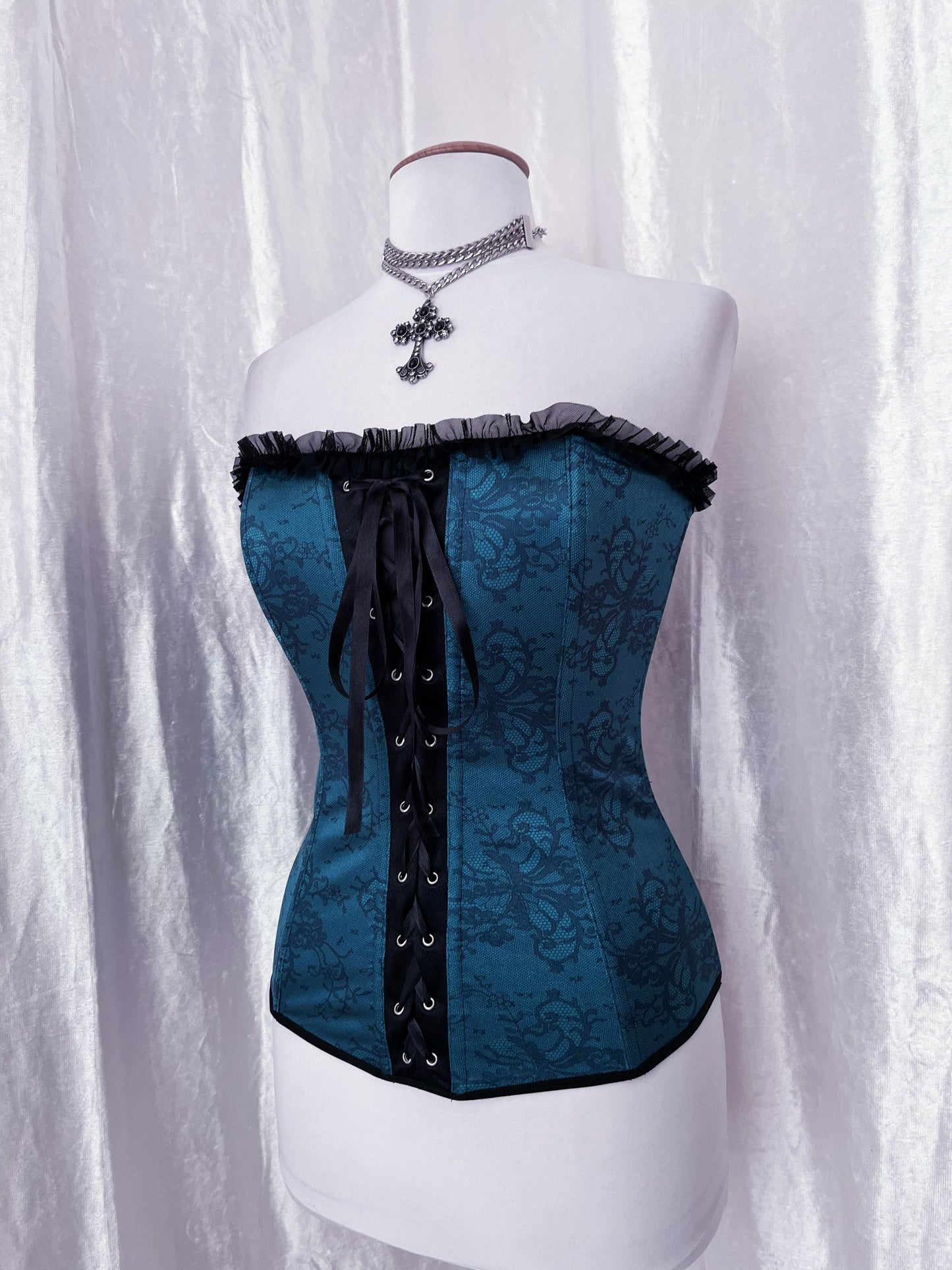 Iconic teal lace-up corset with mesh back 🕸️