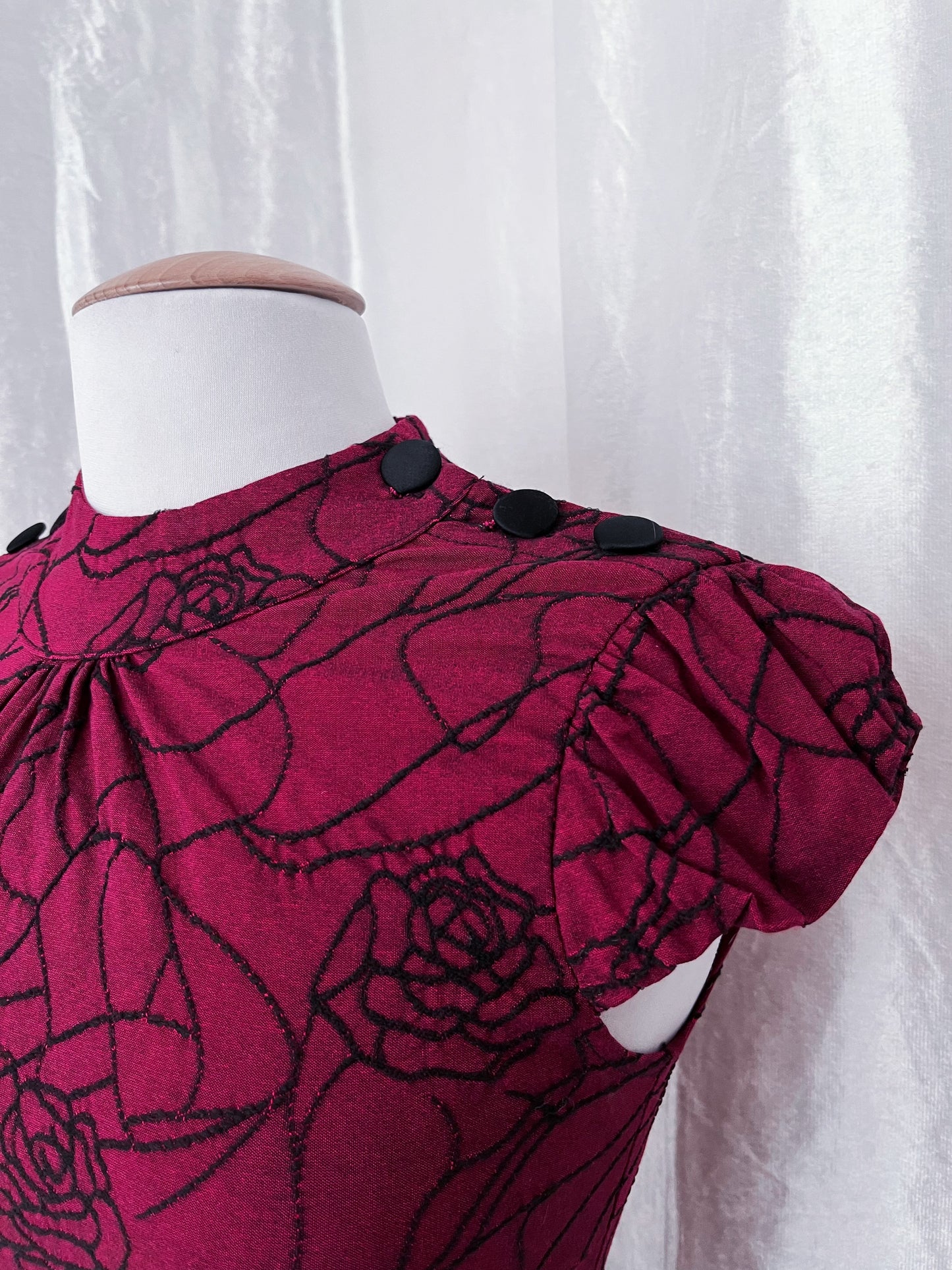 Iconic burgundy Asian style dress with embossed floral details 🌹 🐉