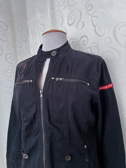 00’s iconic denim jacket with embroidered back detail 🌀