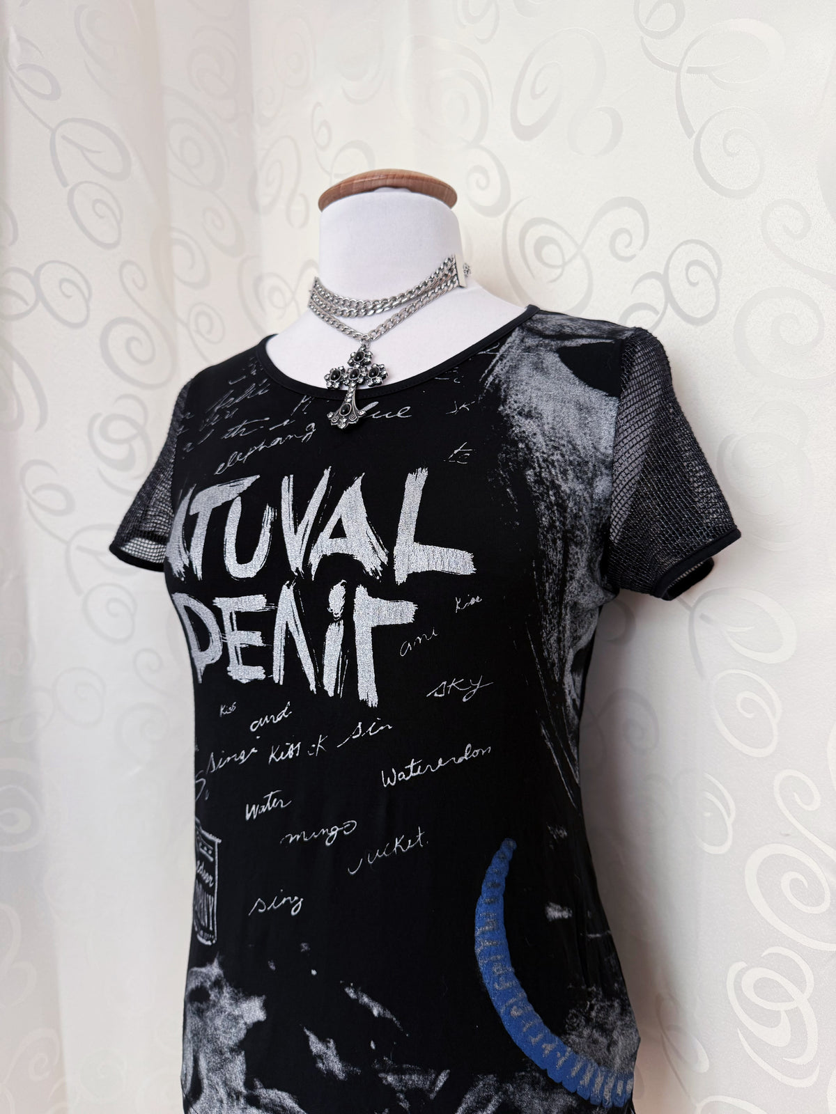 Alt Y2K style black graphic top with fishnet & lace up back 🦇🫀