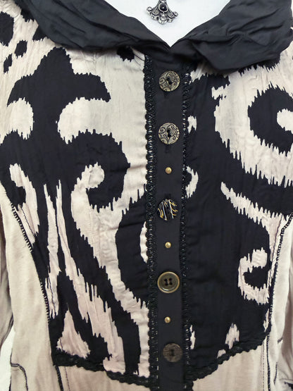 Tim Burton style whimsy spiral cream shirt 🌀🦇