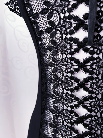 Witchy black top with embroidered cut-out detail 🕷️🕸️