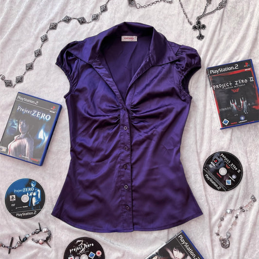 Iconic Horror Protagonist purple shirt 📷🎞️