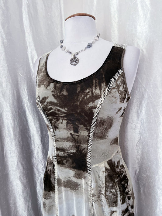 00's iconic mesh printed dress with little pockets on the sides ✨