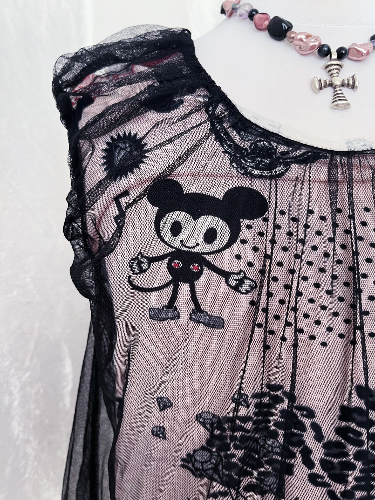 Twee 00’s top with cartoon & pop-culture print fabric with mesh layer on top 🐁🎪