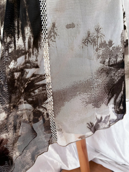 00's iconic mesh printed dress with little pockets on the sides ✨