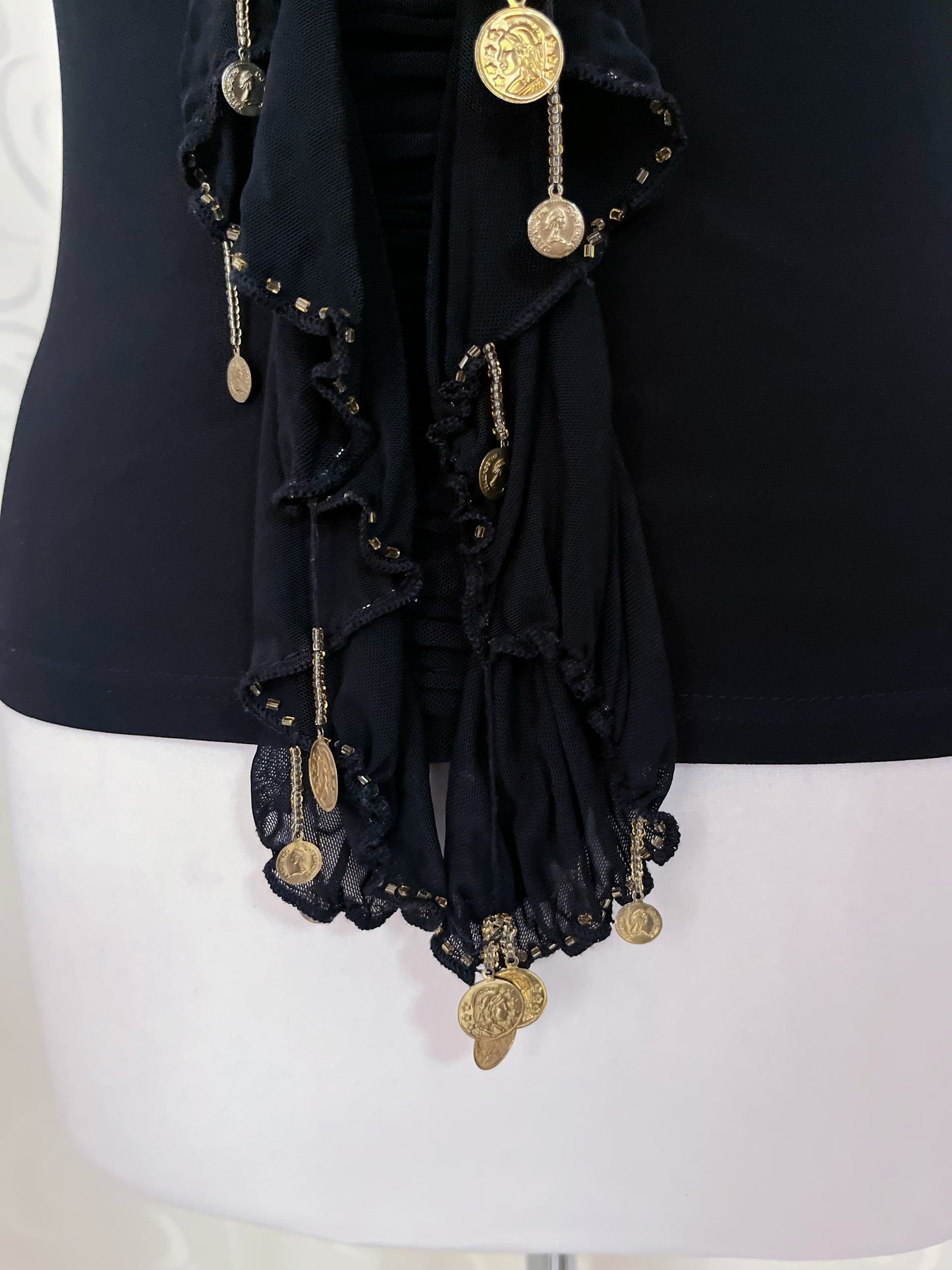 Whimsy fit tank top with little ruffle & golden charm detail ✨