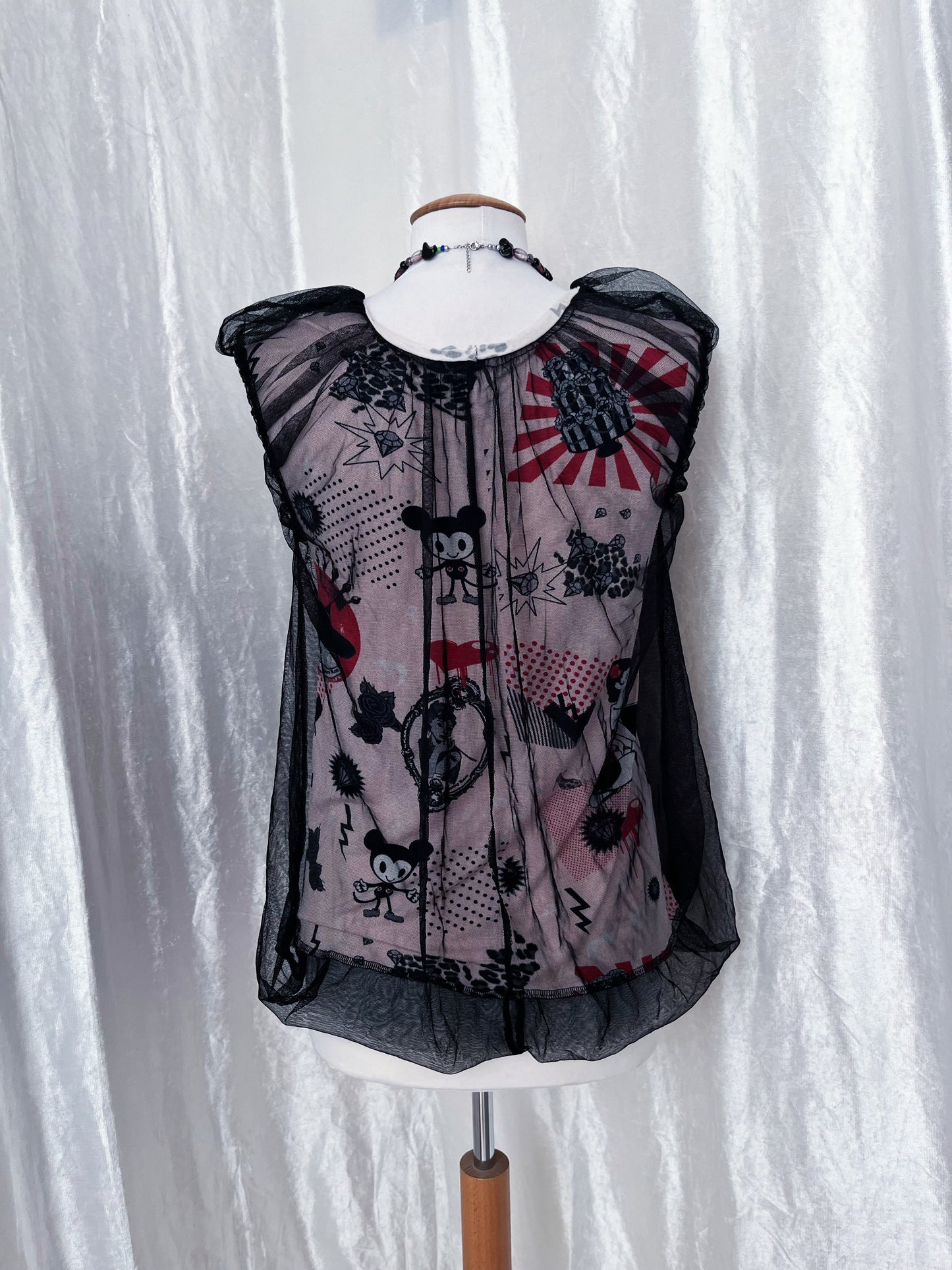 Twee 00’s top with cartoon & pop-culture print fabric with mesh layer on top 🐁🎪