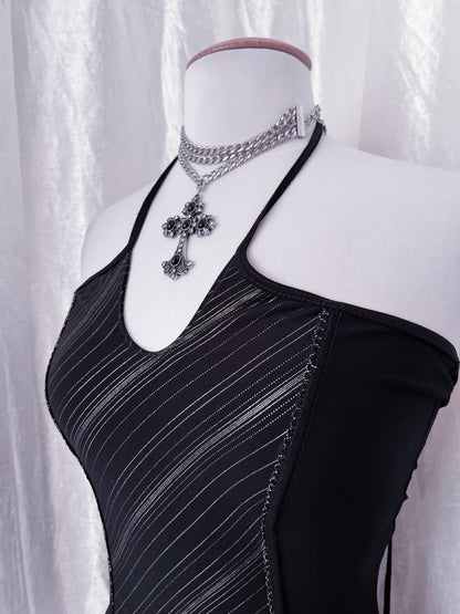 00’s halter top with lace-up back detail 🦇